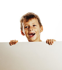 Image showing little cute boy holding empty shit to copyspace isolated close u