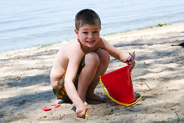 Image showing Playing in the sand