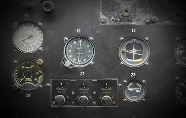 Image showing Different meters and displays in an old plane