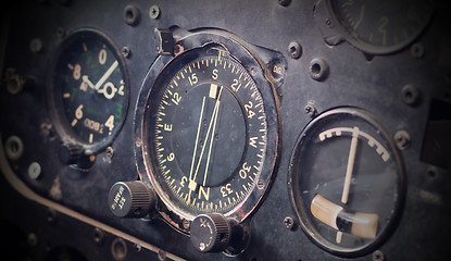 Image showing Different meters and displays in an old plane