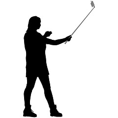 Image showing Silhouettes woman taking selfie with smartphone on white background. illustration