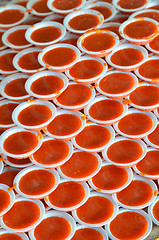 Image showing Stack of hot chili paste