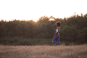 Image showing young black woman in nature