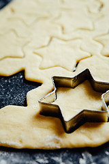 Image showing Star form placed in a cookie dough