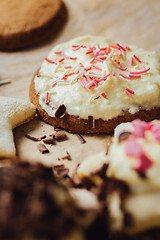 Image showing Appetizing homemade cookie with pink topping