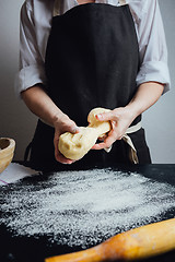 Image showing Person making a cookie dough