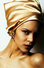 Image showing beauty african woman in shawl on head, very elegant look with gold jewelry close up mulatto dark afro