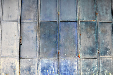 Image showing Vintage and old blue metal door