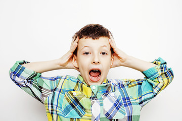 Image showing young pretty little boy kid wondering, posing emotional face isolated on white background, gesture happy smiling close up, lifestyle people concept