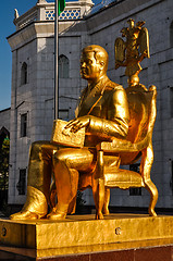 Image showing Golden man with book