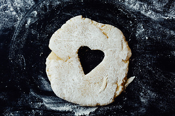 Image showing dough with heart cut out