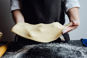 Image showing Cook working with homemade sandy paste