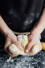 Image showing Cook beating up cookie dough