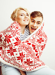 Image showing young pretty teenage couple, hipster guy with his girlfriend happy smiling and hugging isolated on white background, lifestyle people concept, valentine design winter plaid