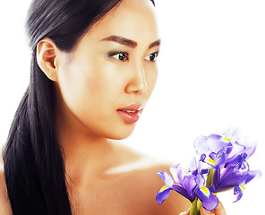 Image showing young pretty asian woman with flower purple orchid close up isolated on white background spa, healthcare concept