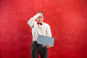 Image showing Young funny man with empty blank sign