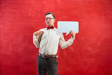 Image showing Young funny man with empty blank sign