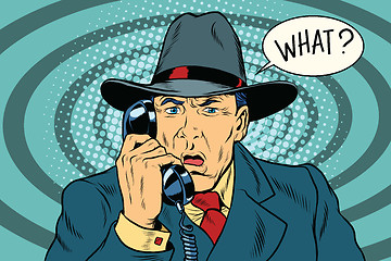 Image showing What Surprised retro businessman talking on the phone