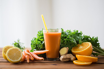Image showing glass of carrot juice, fruits and vegetables