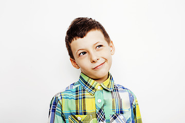 Image showing young pretty little boy kid wondering, posing emotional face isolated on white background, gesture happy smiling close up, lifestyle people concept