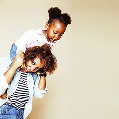 Image showing adorable sweet young afro-american mother with cute little daugh