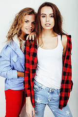 Image showing two best friends teenage girls together having fun, posing emotional on white background, besties happy smiling, making selfie, lifestyle people concept