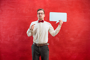 Image showing Young funny man with empty blank sign