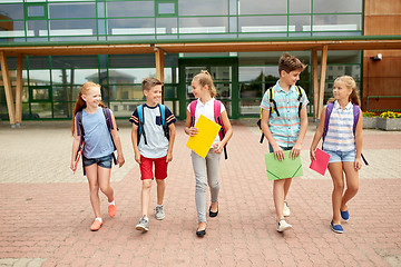 Image showing group of happy elementary school students walking