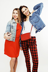 Image showing best friends teenage girls together having fun, posing emotional on white background, besties happy smiling, lifestyle people concept