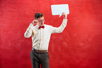 Image showing Young funny man with empty blank sign