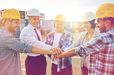 Image showing builders and architects with hands on top