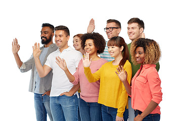 Image showing international group of happy people waving hand