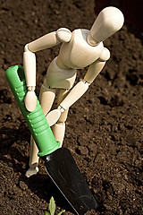 Image showing Mannequin digging