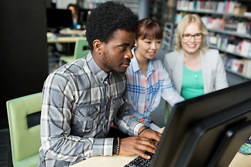 Image showing international students with computers at library