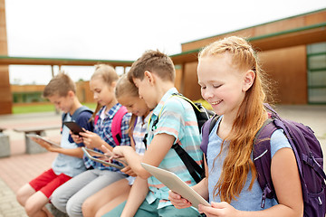 Image showing group of happy elementary school students talking