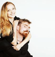 Image showing young hipster couple fooling around on white background close up