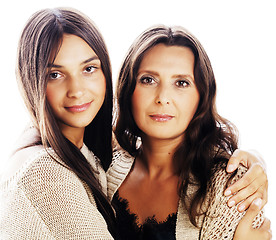 Image showing cute pretty teen daughter with mature mother hugging, fashion st