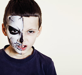 Image showing little cute boy with facepaint like skeleton to celebrate hallow