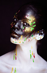 Image showing woman with creative makeup closeup like drops of colors, facepai