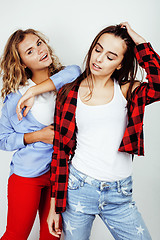 Image showing two best friends teenage girls together having fun, posing emotional on white background, besties happy smiling, making selfie, lifestyle people concept