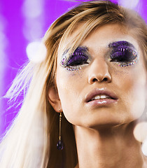 Image showing beauty young snow queen in fairy flashes with hair crown on her 