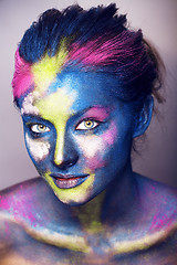 Image showing beauty woman with creative make up like Holy celebration in Indi