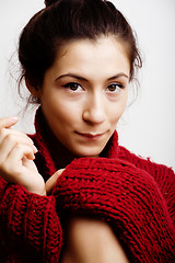 Image showing young pretty woman in sweater and scarf all over her face, lifes