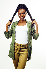 Image showing young pretty african-american girl posing cheerful emotional on white background isolated, lifestyle people concept