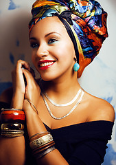 Image showing beauty bright african woman with creative make up, shawl on head