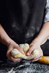 Image showing Cook beating up cookie dough