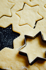 Image showing Star form placed in a cookie dough