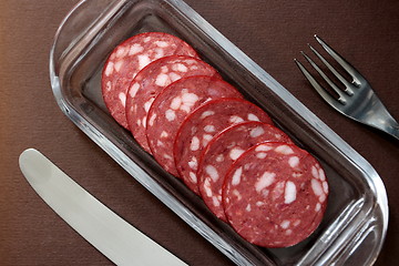 Image showing slices salami on a plate