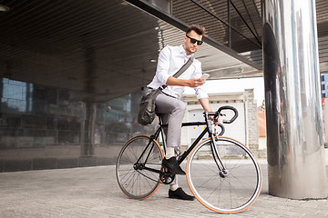 Image showing man with bicycle and smartphone on city street