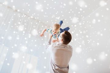 Image showing father with son playing and having fun at home